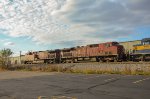 CP AC44CW Locomotives leading a train